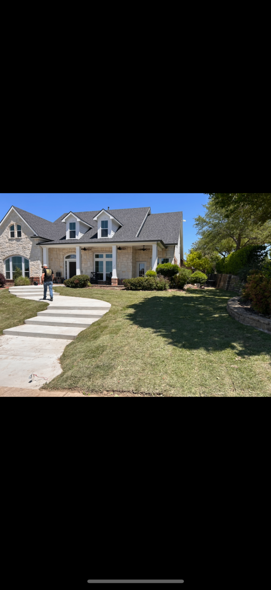 Beautifully landscaped DFW backyard at dusk
